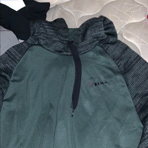 Nike hoodie with “nike” along the sleeves.